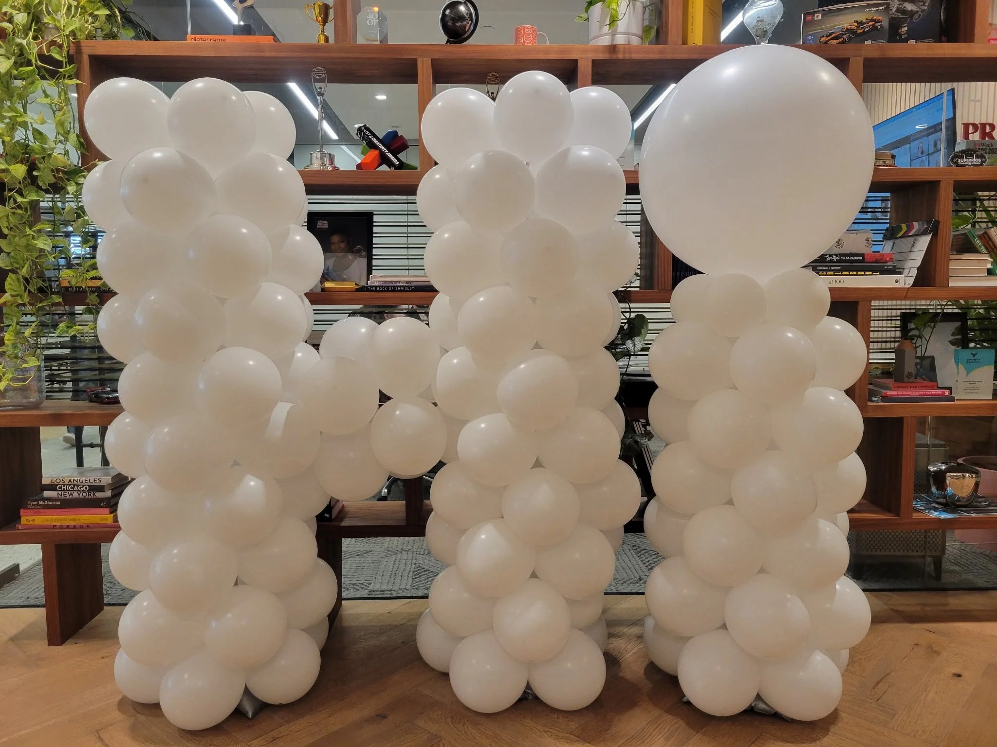 Giant white balloon HI letter sculpture built for VCCP's Spectrum campaign launch at their Flatiron office in NYC