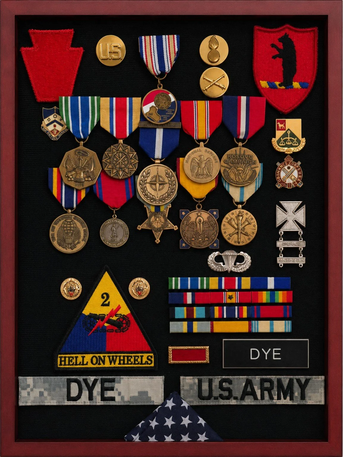 Framed display of my military medals, ribbons, insignia, and Army name tapes.
