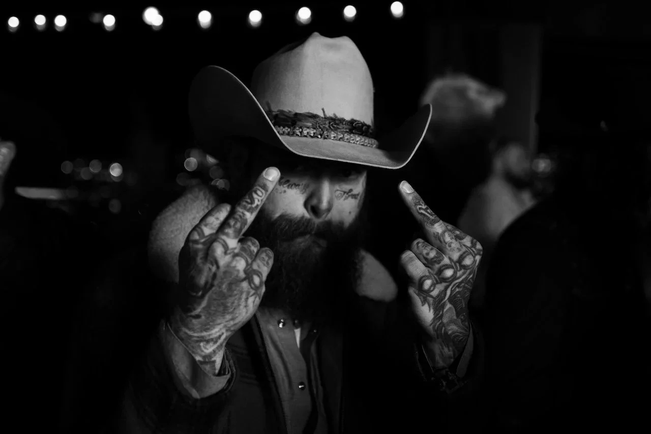 Nashville portrait photographer Hunter Hart - black and white documentary portrait of a tattooed artist