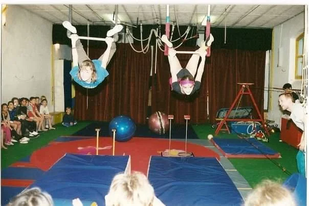 Ophelie as a child doing trapeze