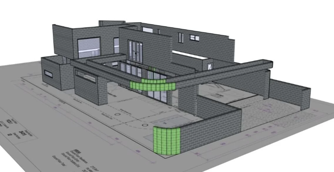 3D blockwork model of a house on its site plan
