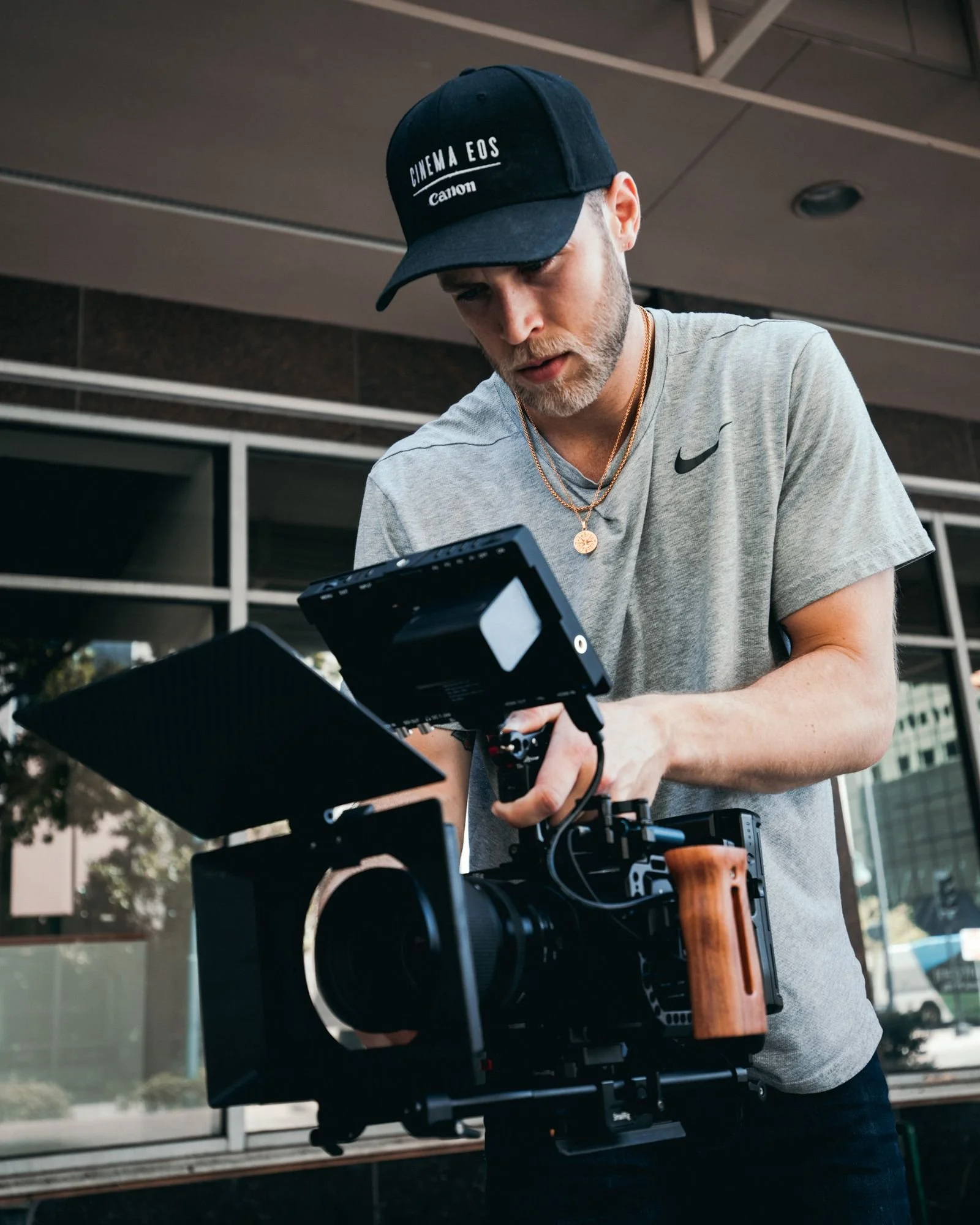 Professional event photographer with camera at a Los Angeles event