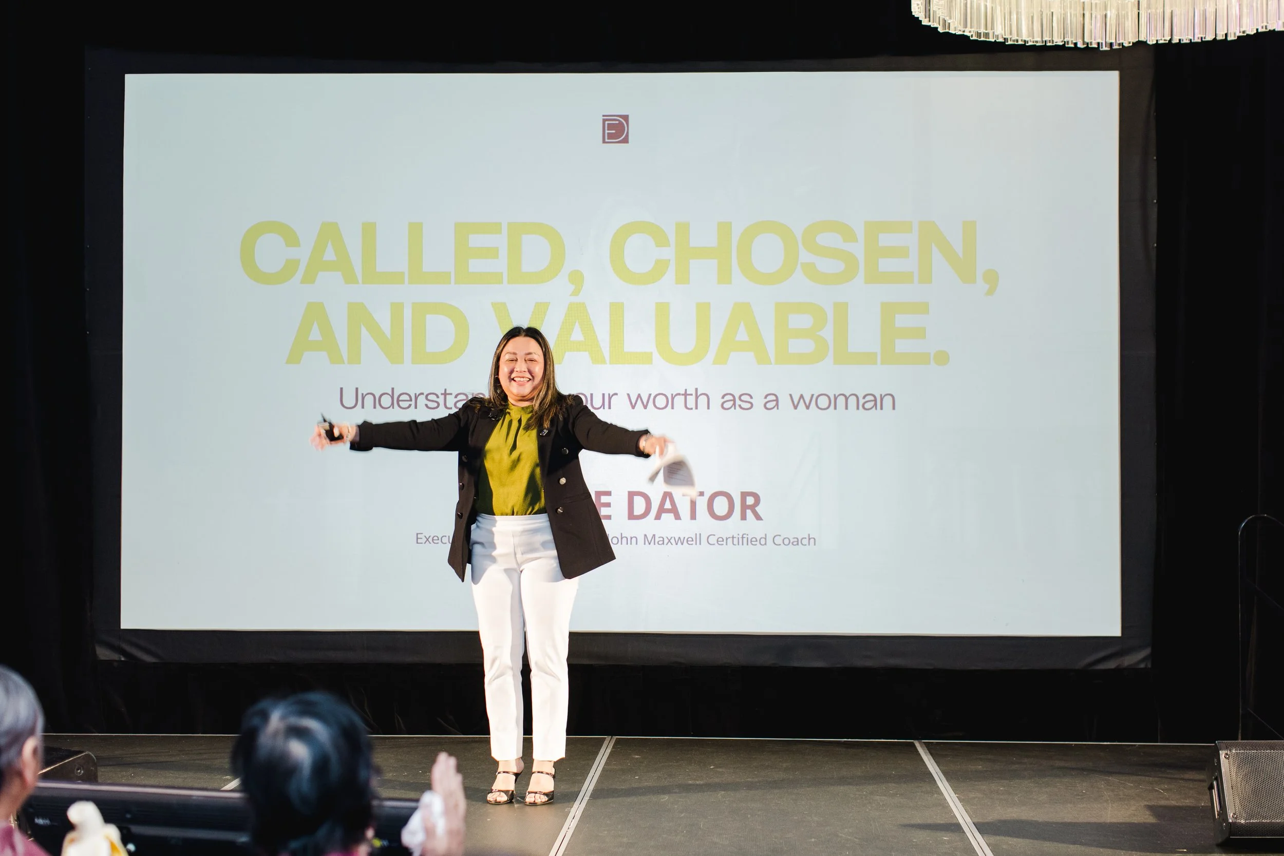 EVC Eunice Dator on stage presenting her session.