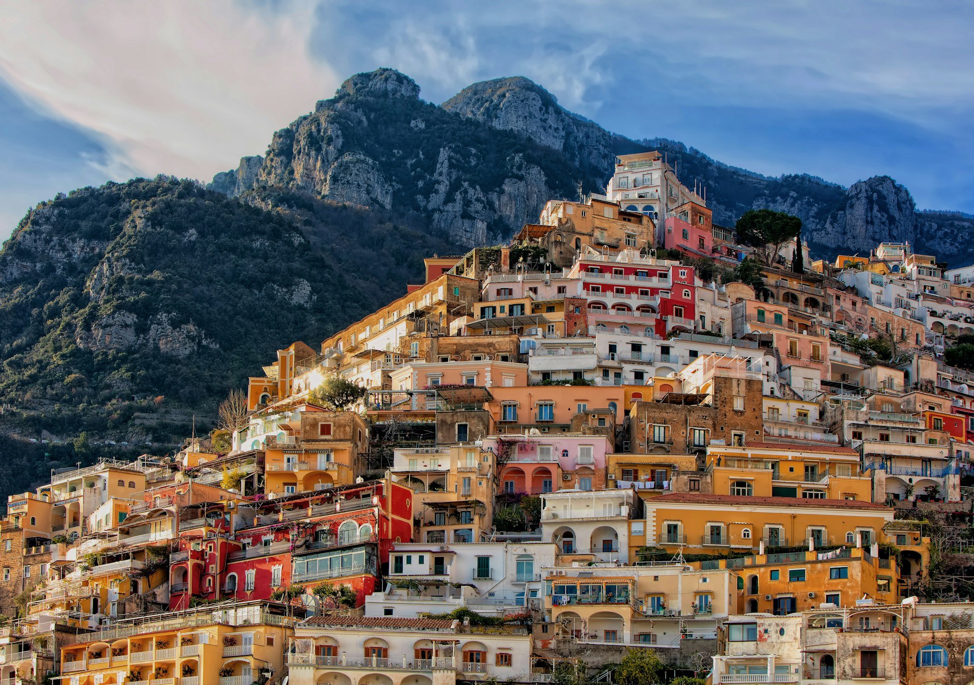 Positano’s colorful houses climbing the cliffs