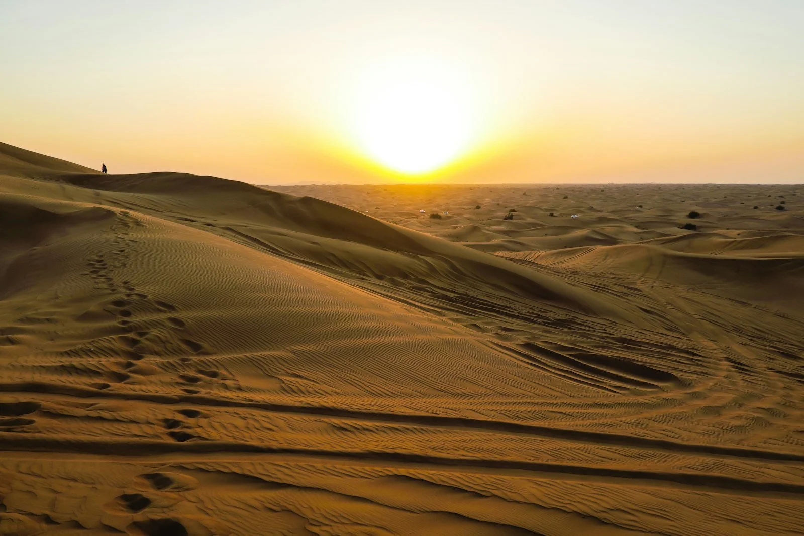 Sunset over the desert dunes outside Dubai