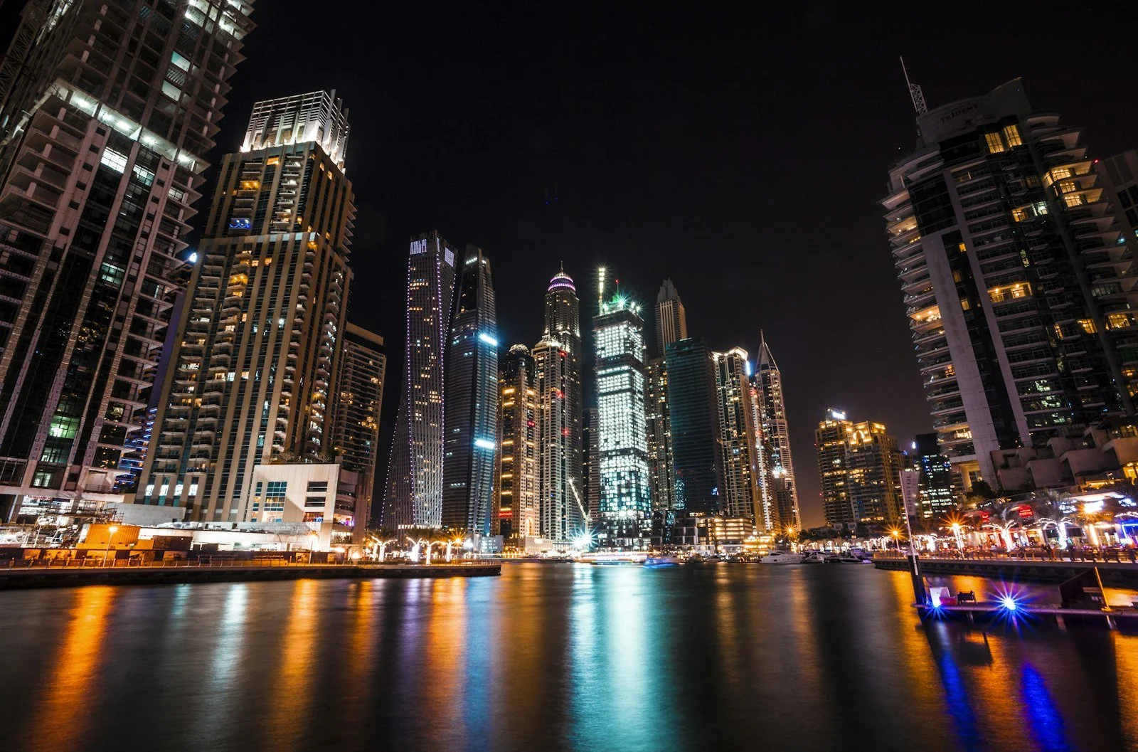 Dubai Marina towers reflected at night