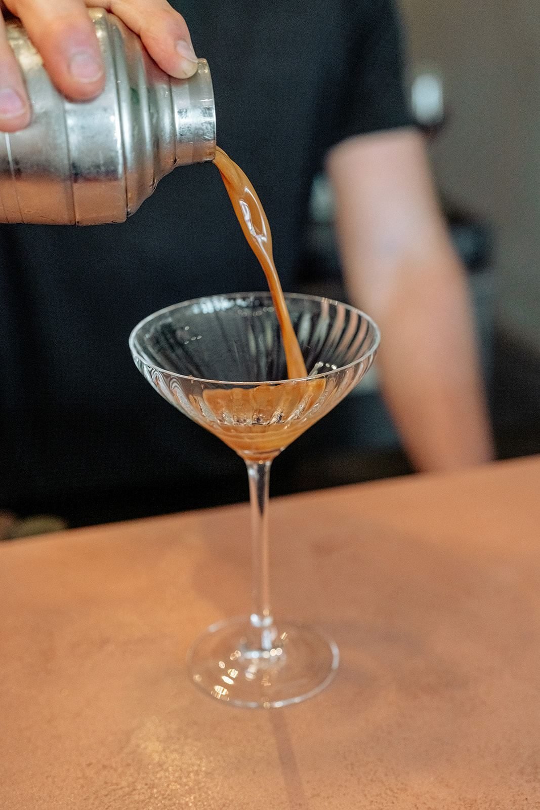 Cocktail at the bar of wine bar Win in Ghent