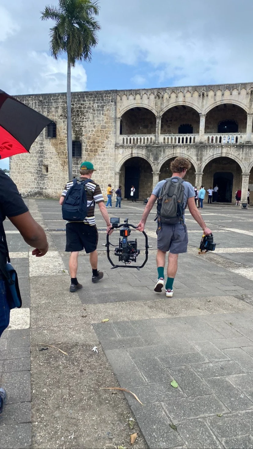 Gimbal operator walking a handheld Ronin 2 shot on location