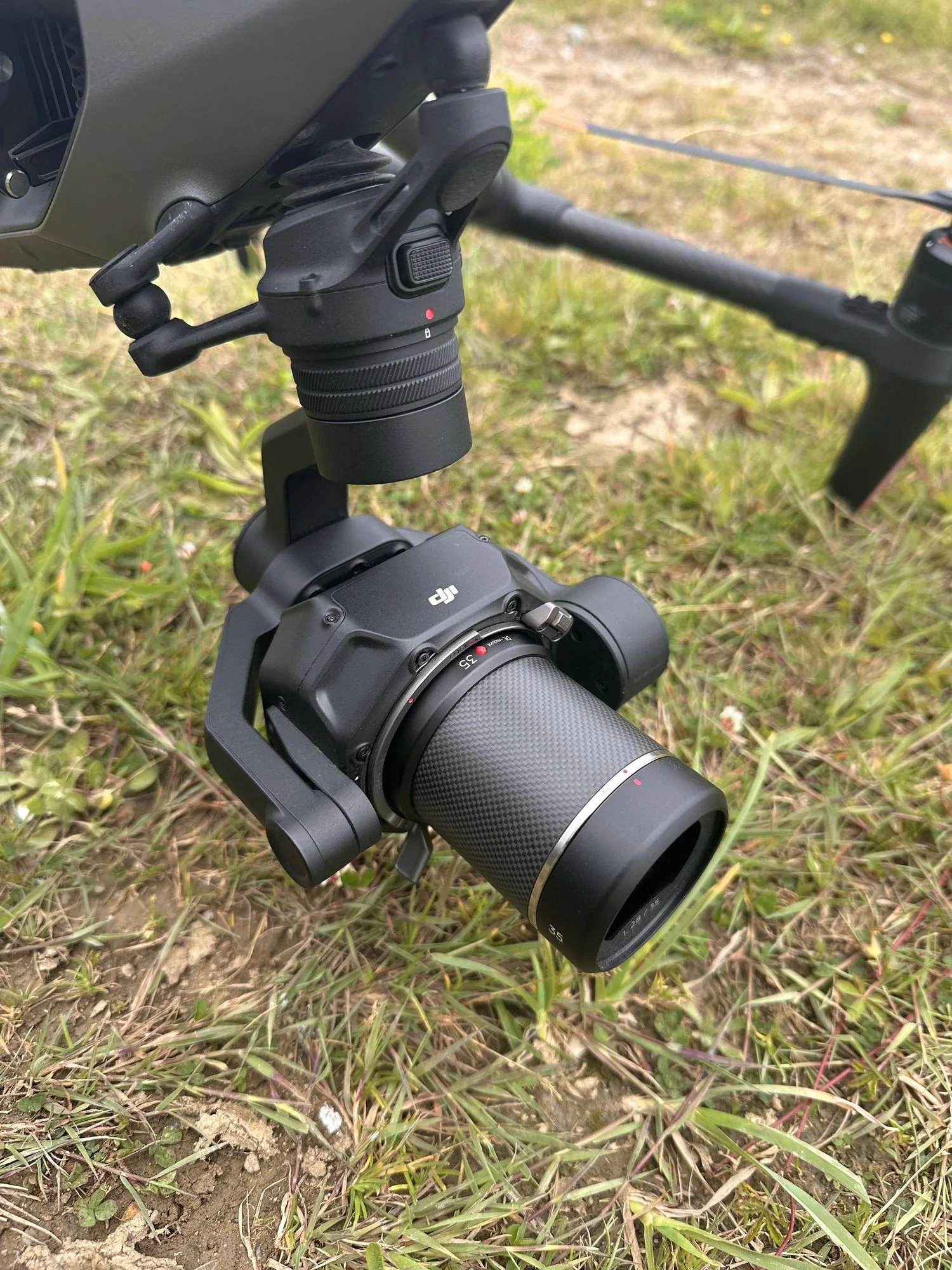 Close-up of the Zenmuse X9-8K full-frame camera with a DJI DL prime lens on the Inspire 3
