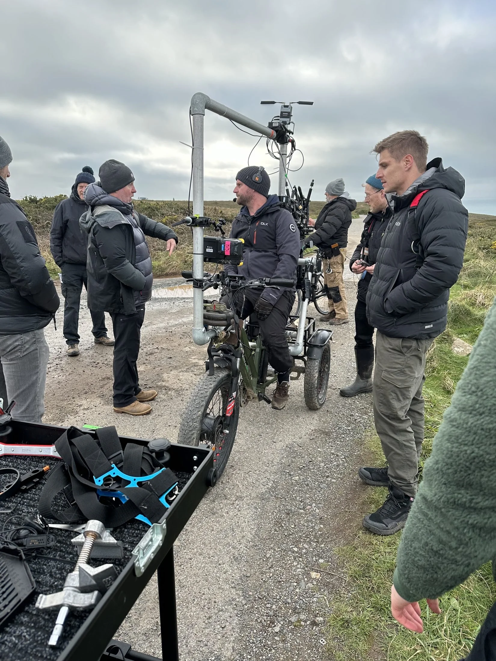 Crew with the cine-trike on a clifftop location