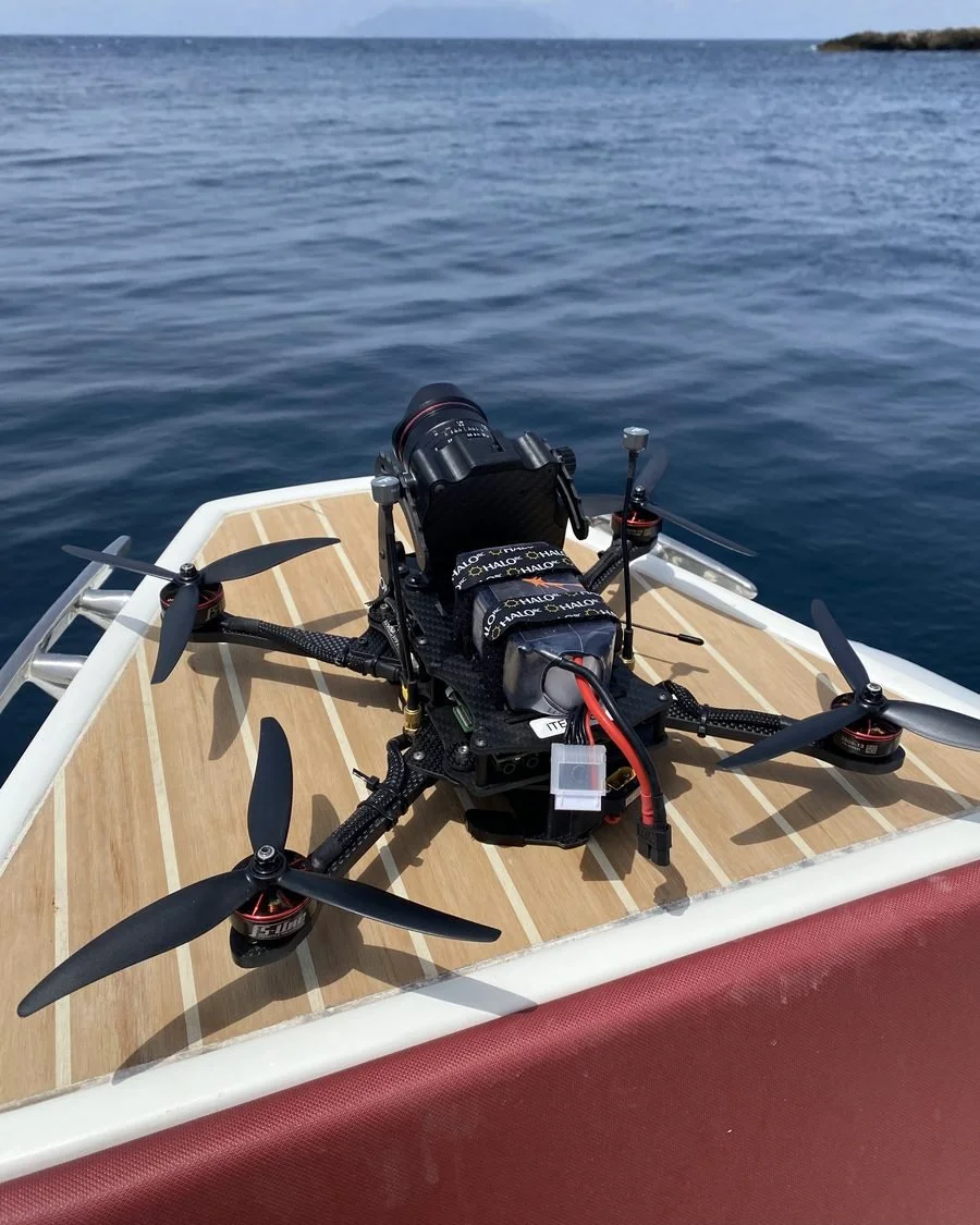 Close-up of an FPV cinelifter carrying a cinema camera