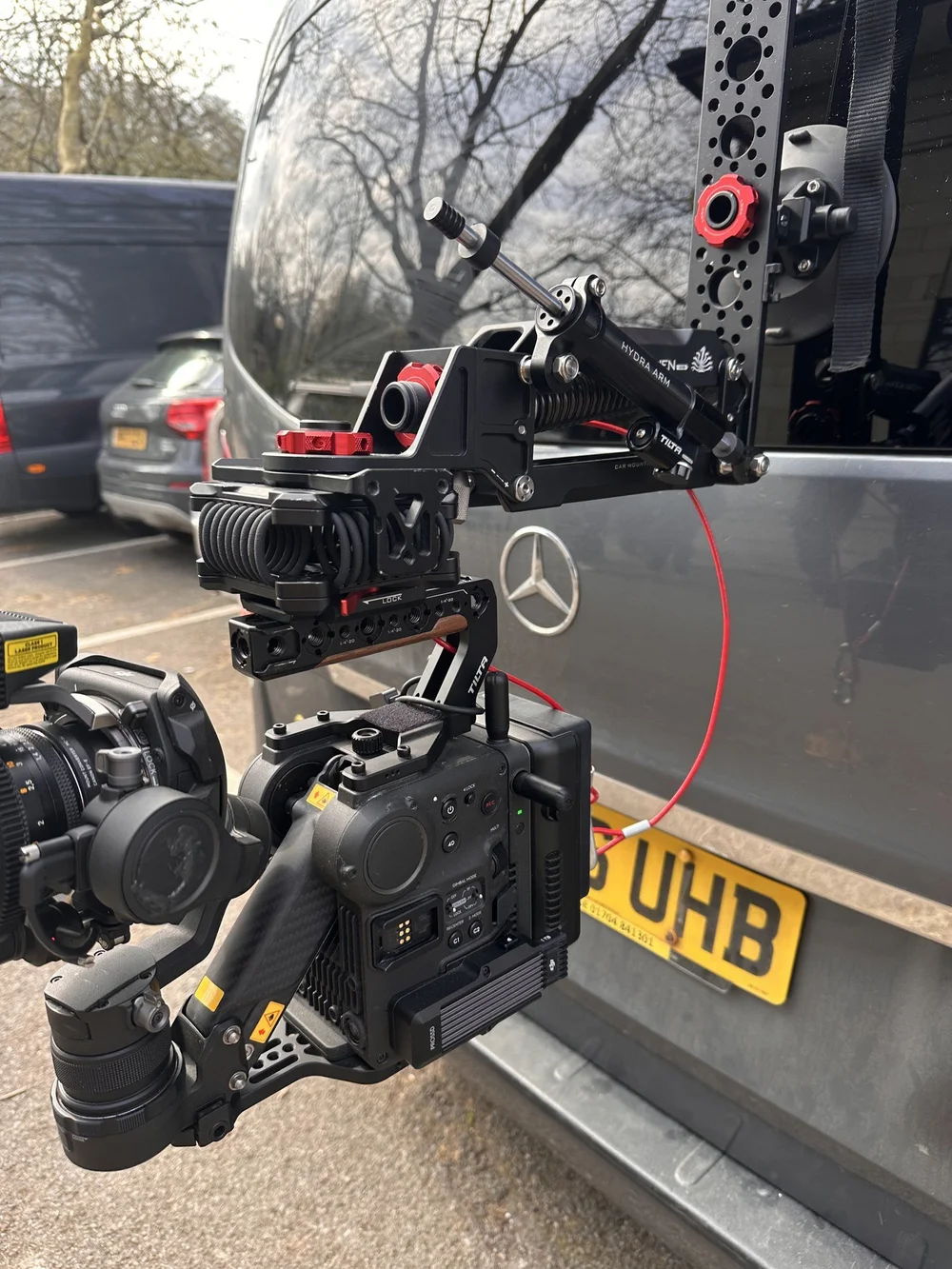 DJI Ronin 4D on a side mount on a van