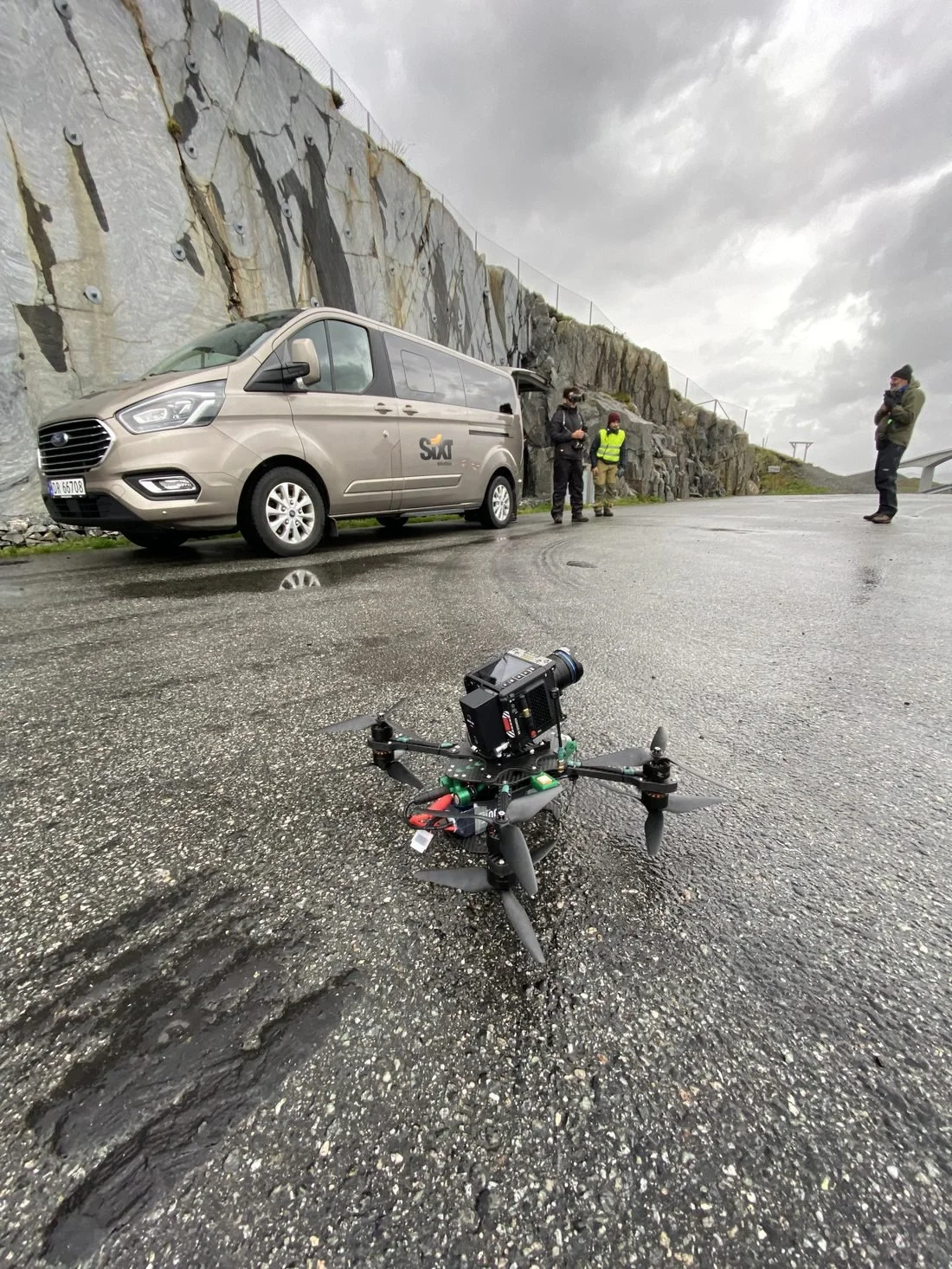 FPV cinelifter carrying a RED Komodo, ready to fly on location
