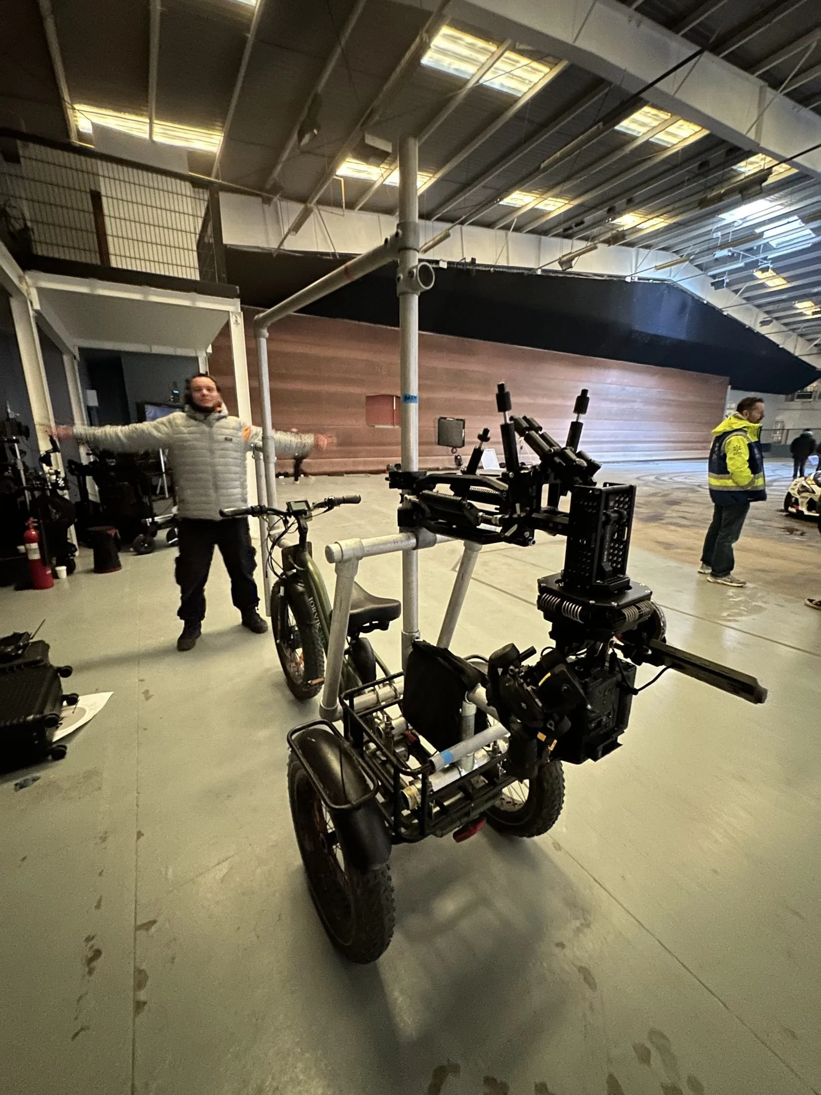 Cine-trike rigged with a Flowcine Black Arm and cinema camera in a studio