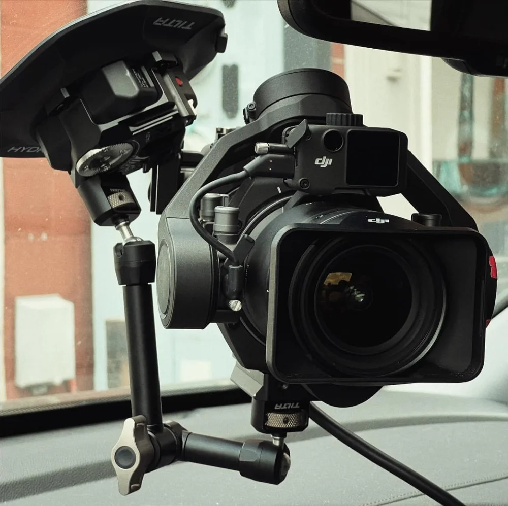DJI Ronin 4D on an arm inside a car