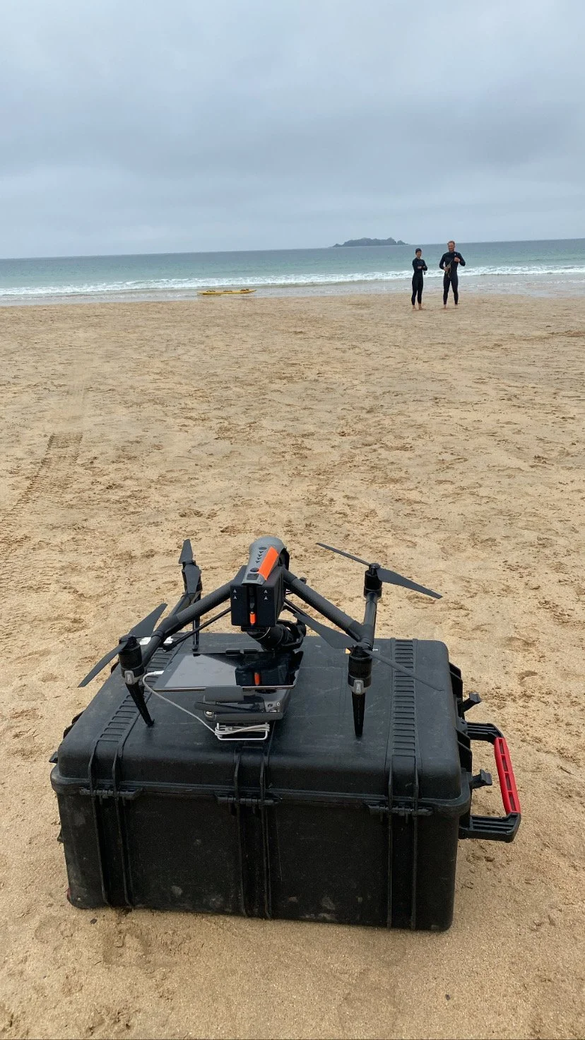 DJI Inspire 2 with Zenmuse X7 on its flight case on a Cornish beach, available for dry hire
