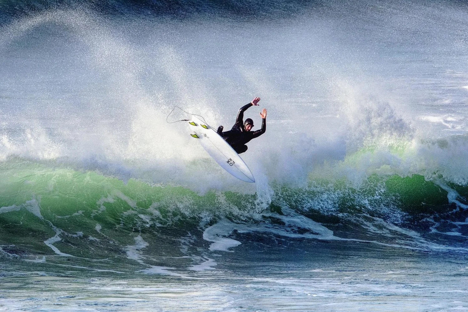 Tim Boydell surfing a wave in Cornwall