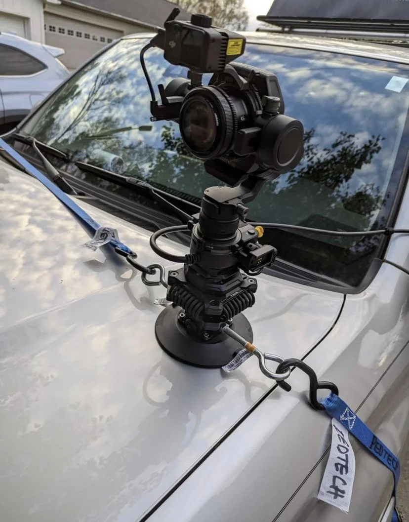 DJI Ronin 4D suction-mounted on a car bonnet