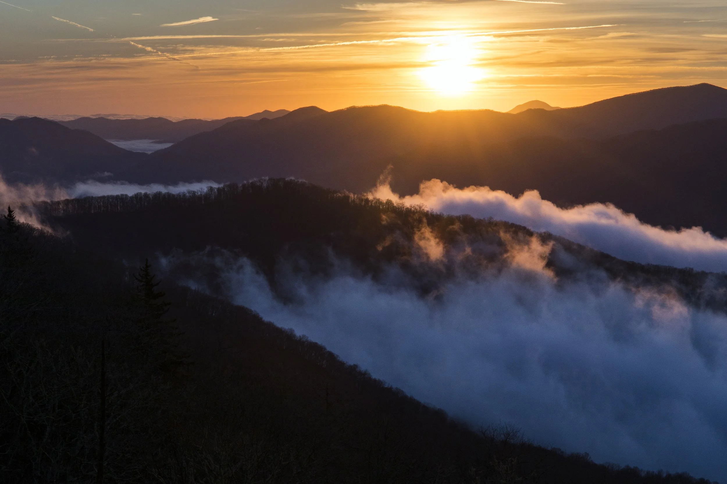 Placeholder for a wide photograph of mist-covered Smoky Mountain ridgelines