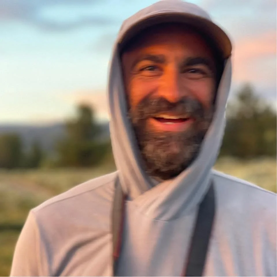 Andrew Slaton, photographer and Patagonia expedition leader, outdoors in warm evening light