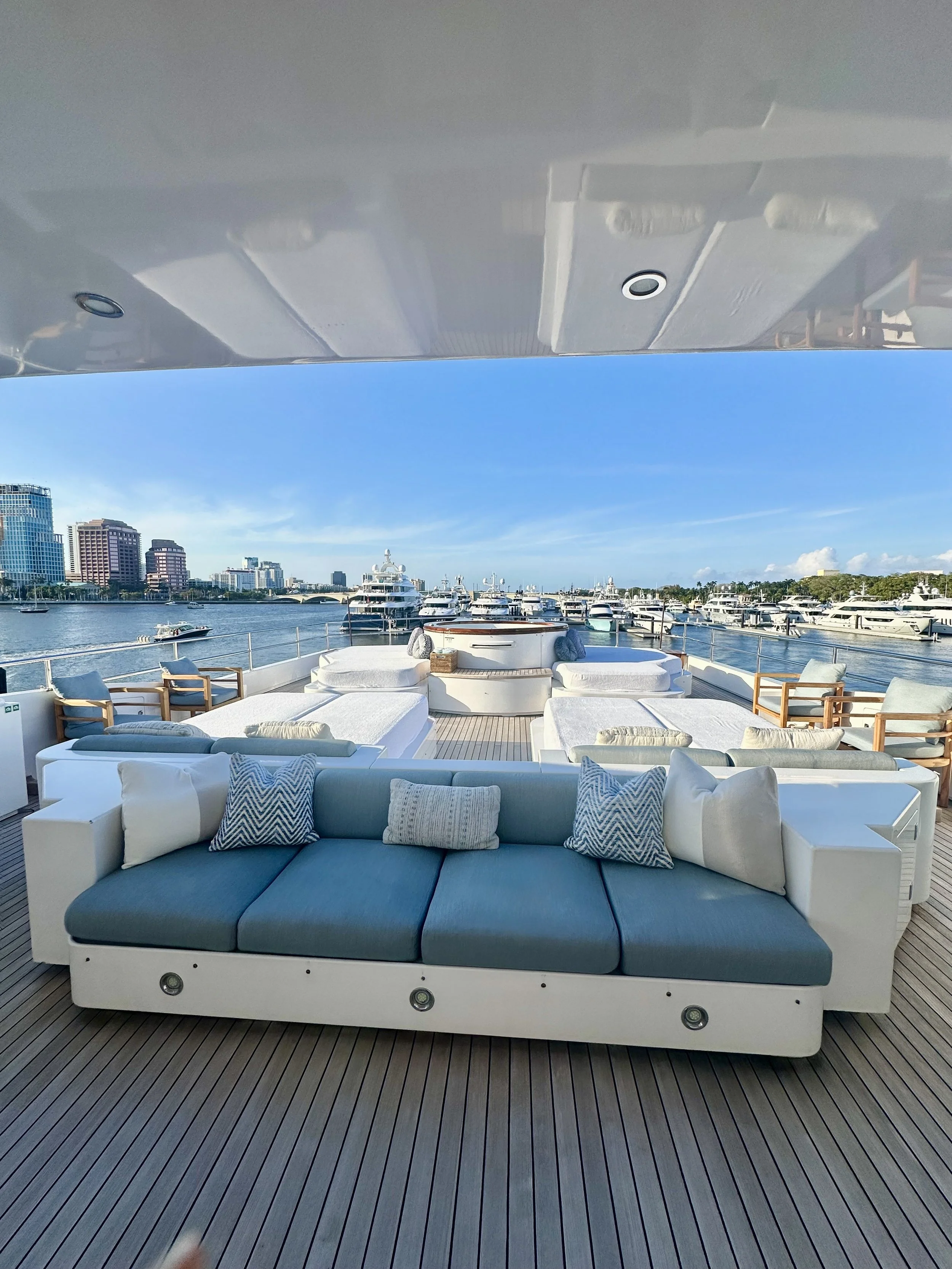 custom marine upholstery yacht salon South Florida luxury yacht salon with custom-fabricated sectional sofa and precision marine upholstery South Florida