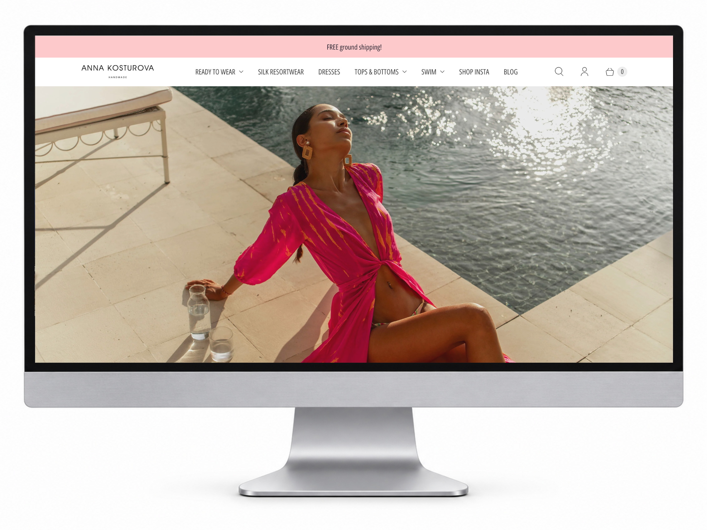 Anna Kosturova homepage shown on a desktop monitor