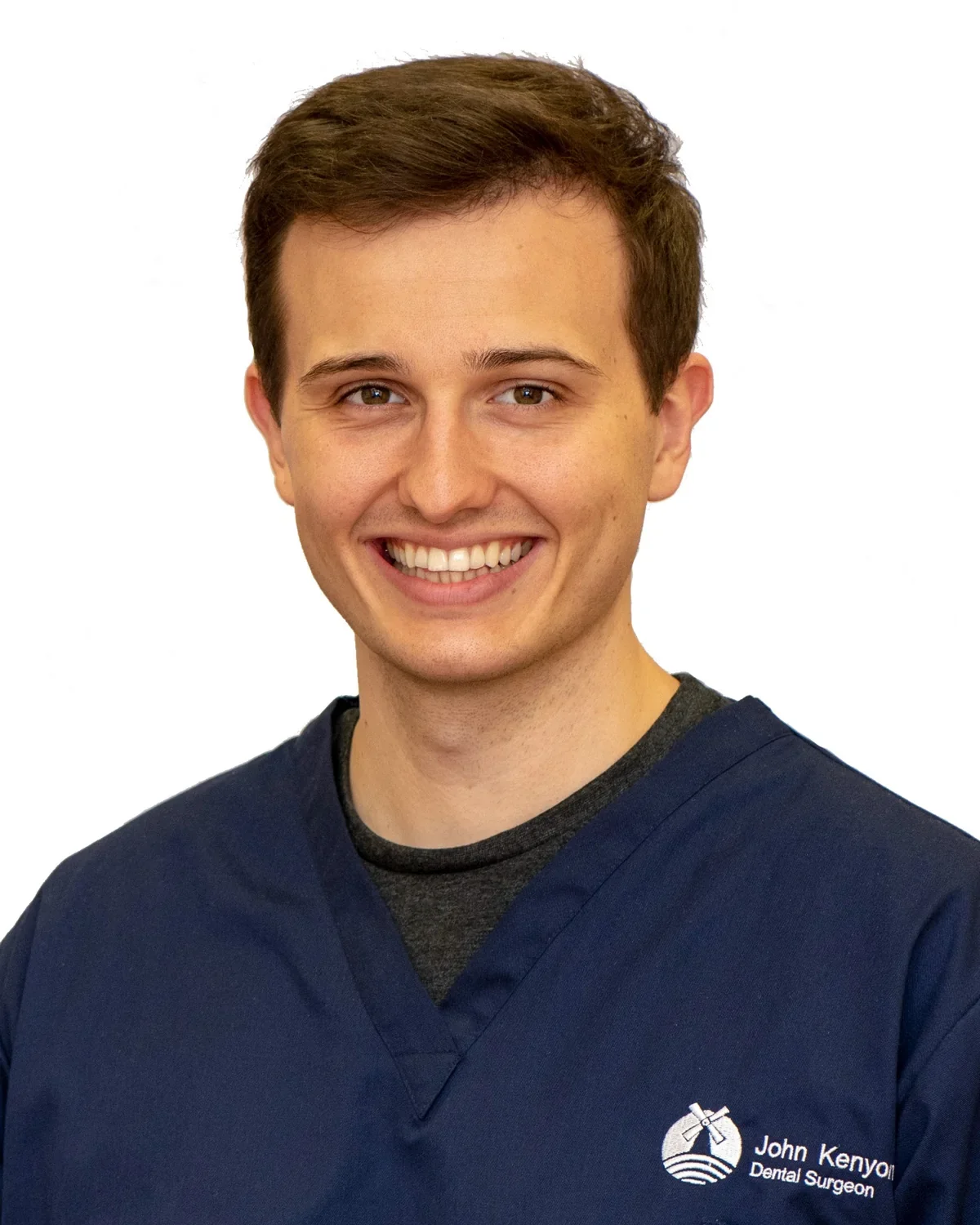 Mr John Kenyon wearing navy clinical scrubs