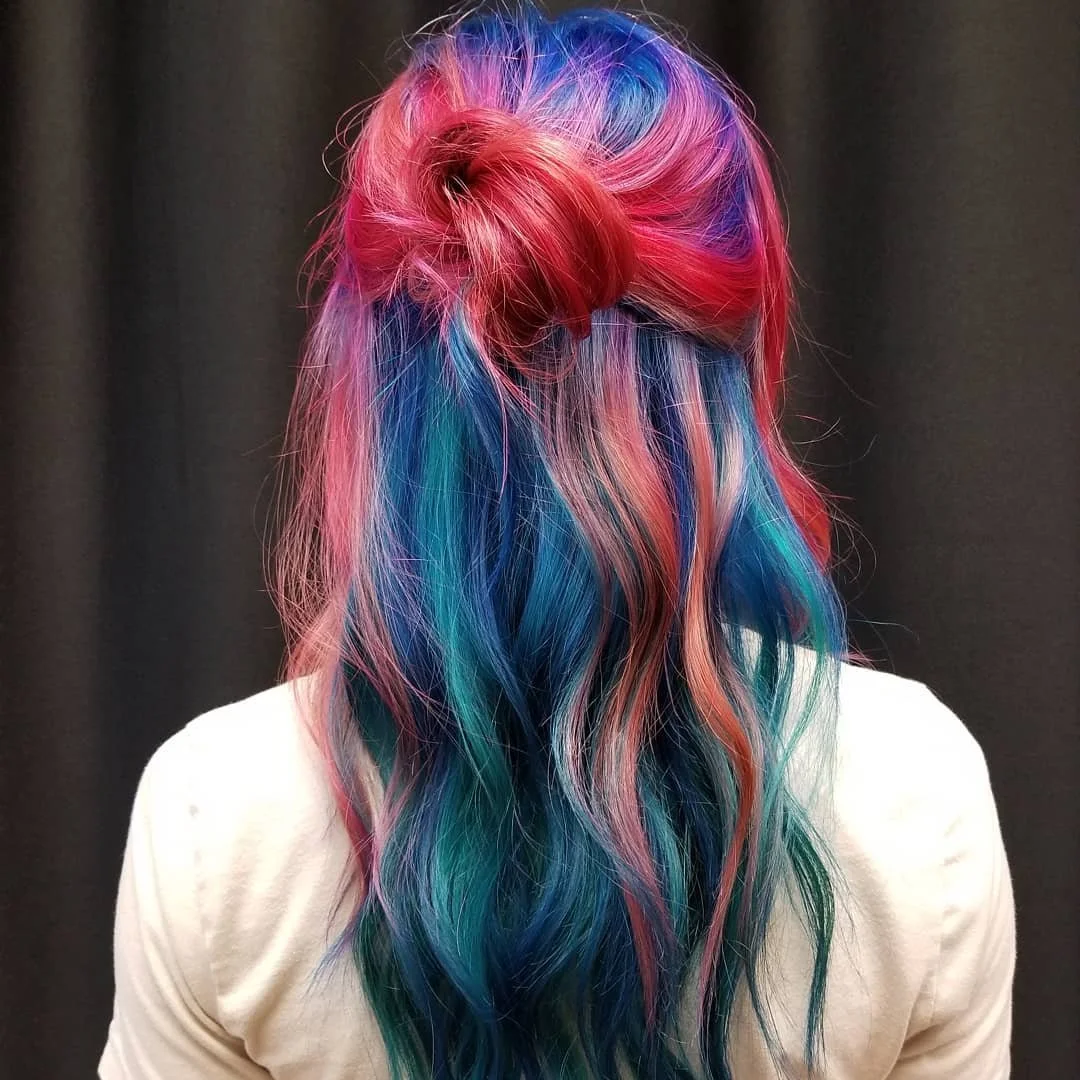 Vivid rainbow hair color transformation by a Las Vegas color specialist