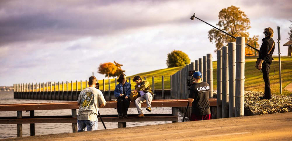 The crew shooting on the lakefront