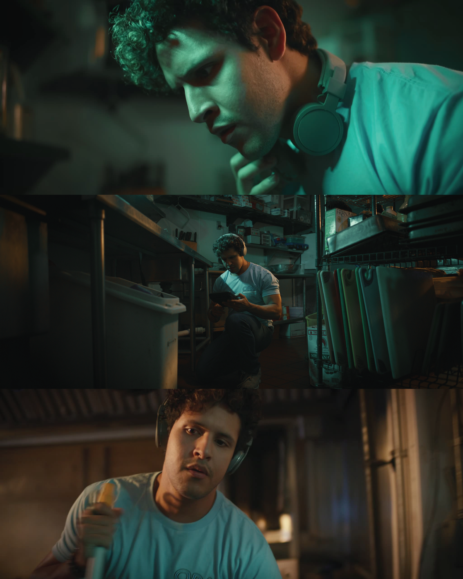 Ethan in the kitchen, headphones around his neck