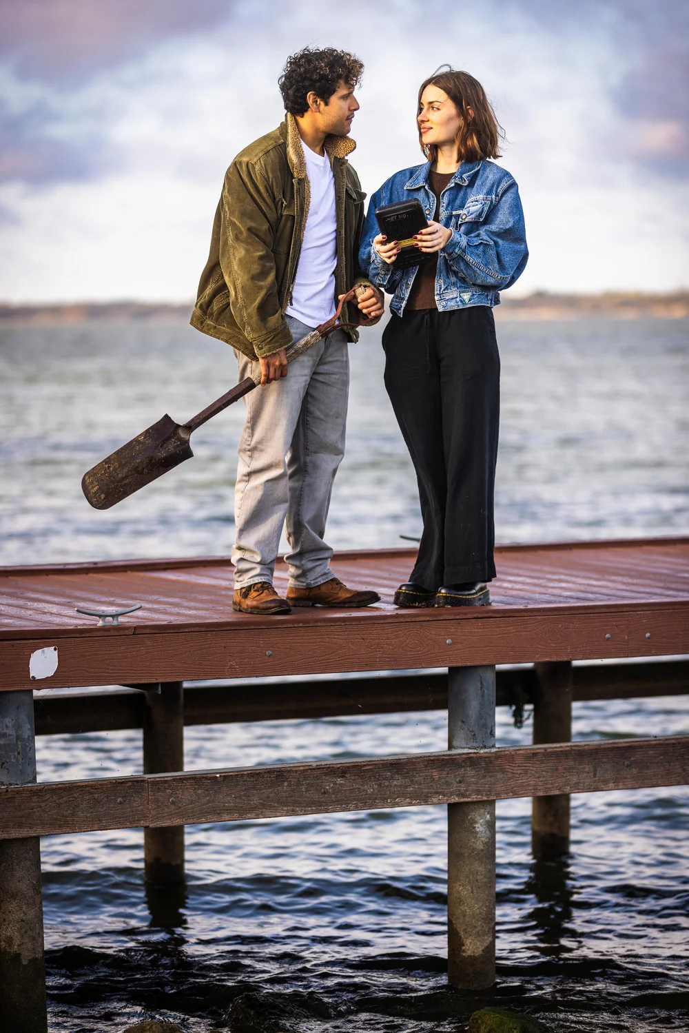 Xavier Alexander and Nicole Alston on the dock with the boom mic