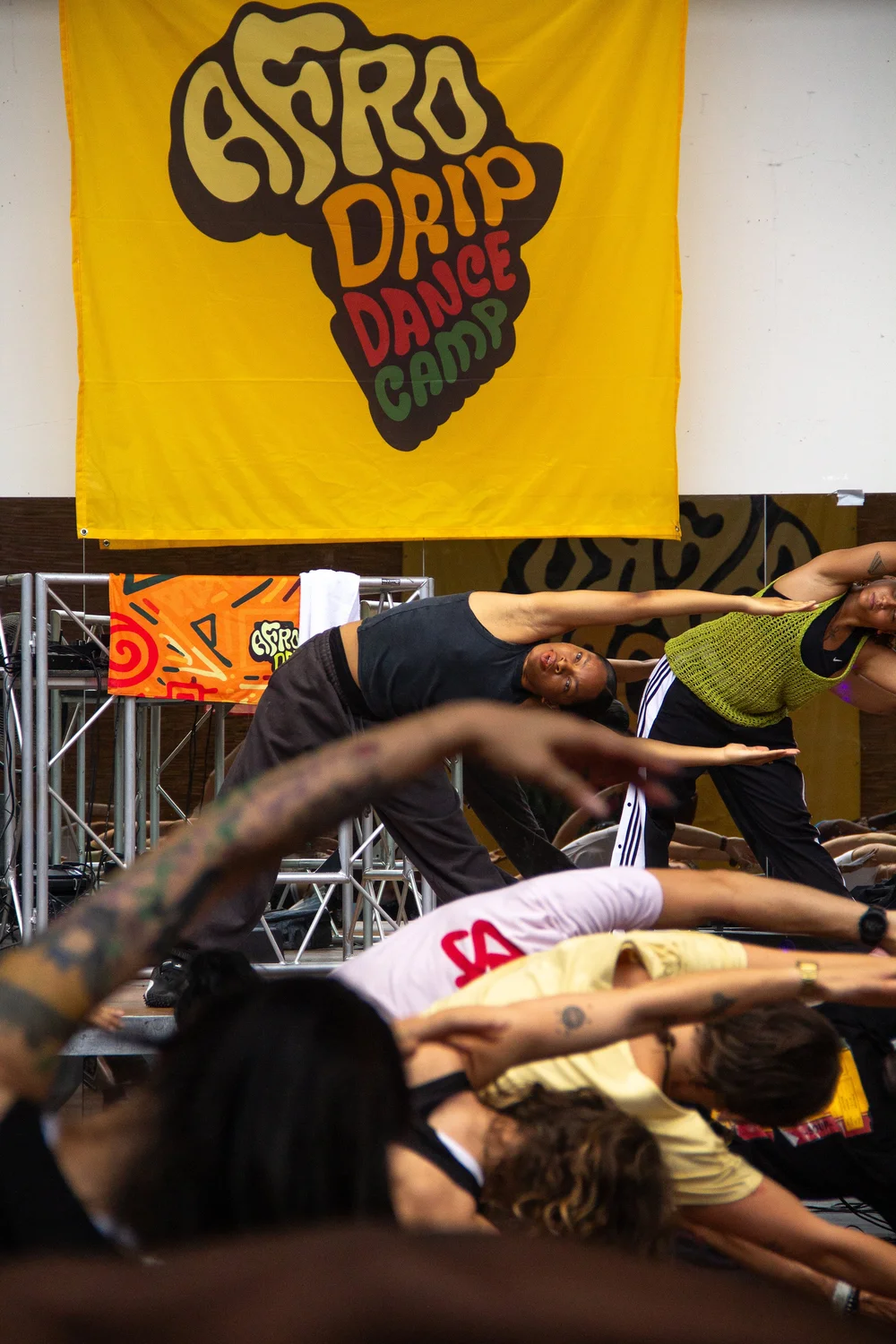 Dancers moving together in an AfroDrip class
