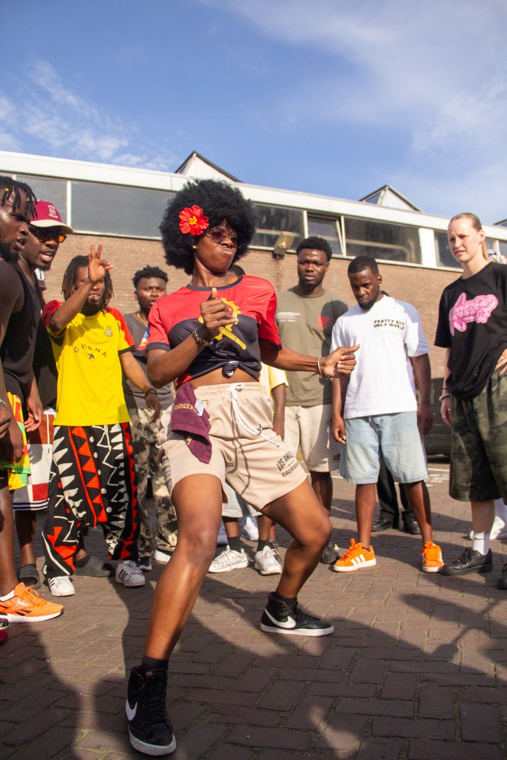 A dancer freestyling in the AfroDrip community circle