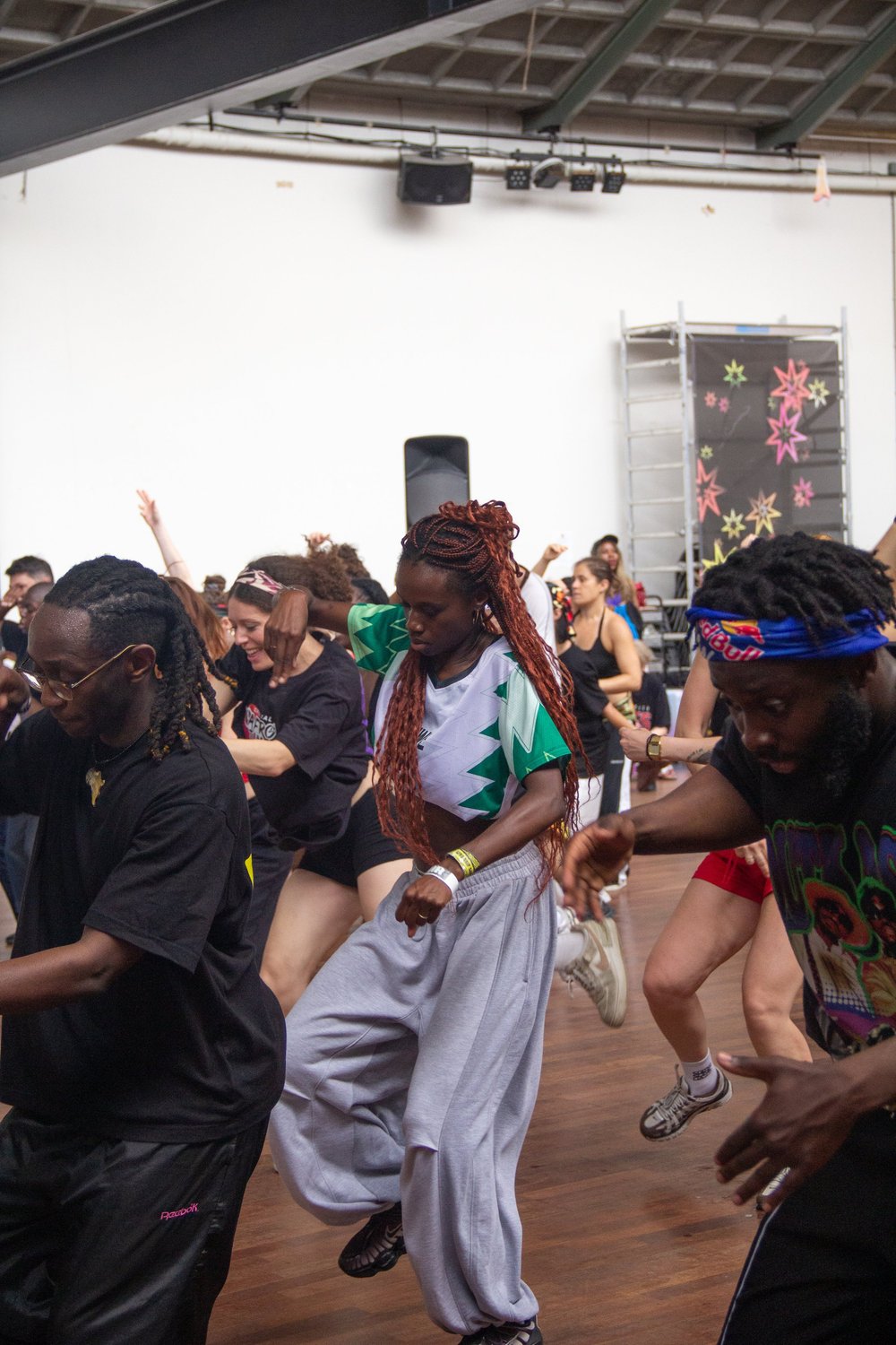 Dancers sharing the rhythm in an AfroDrip class
