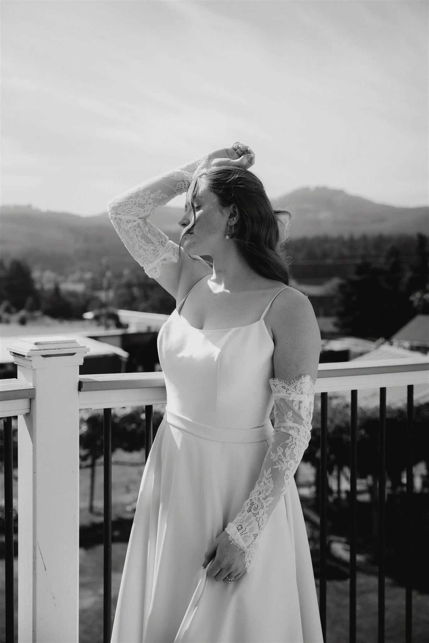 bride standing on a deck in Oregon, after getting ready