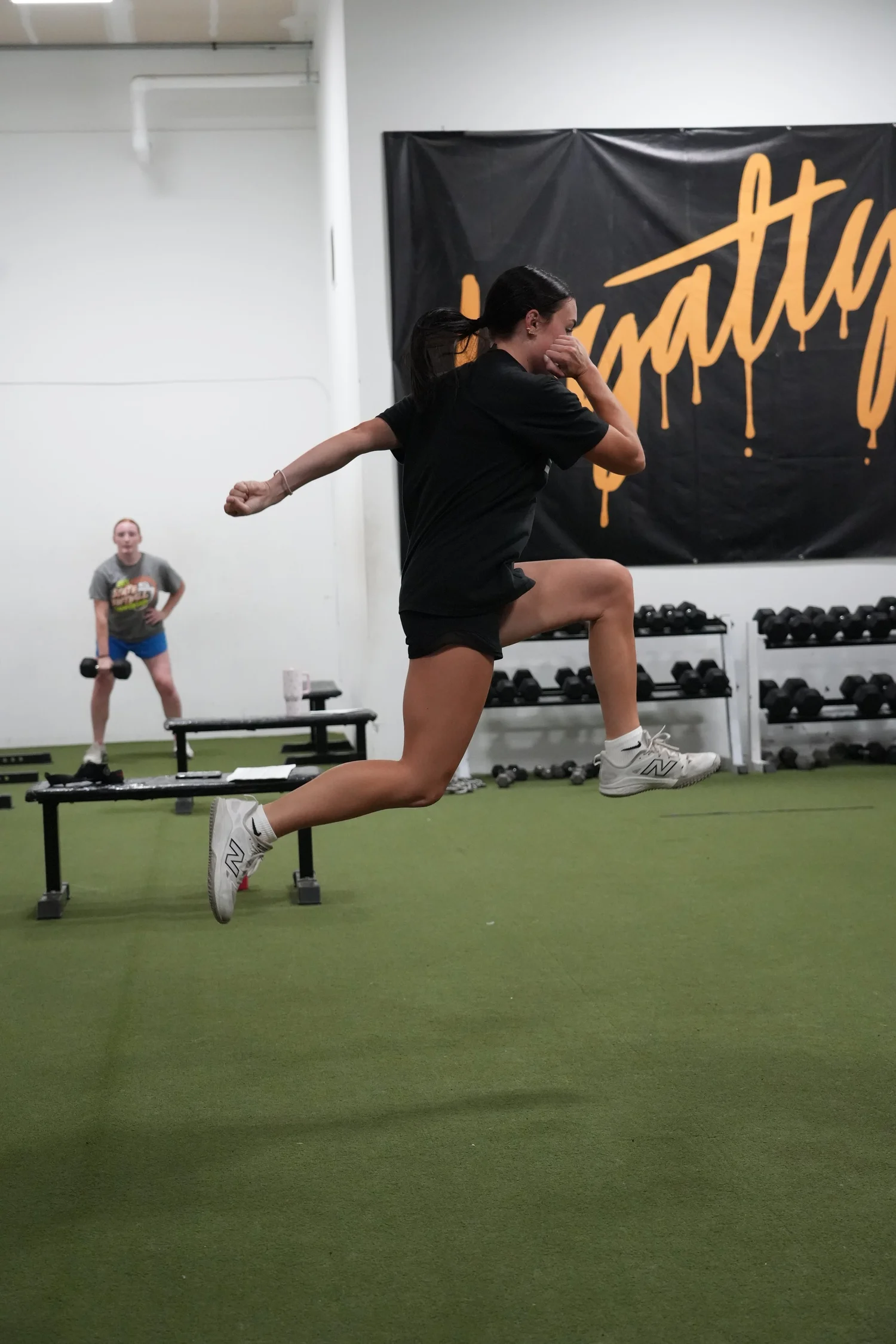 Athlete driving through a lateral bound