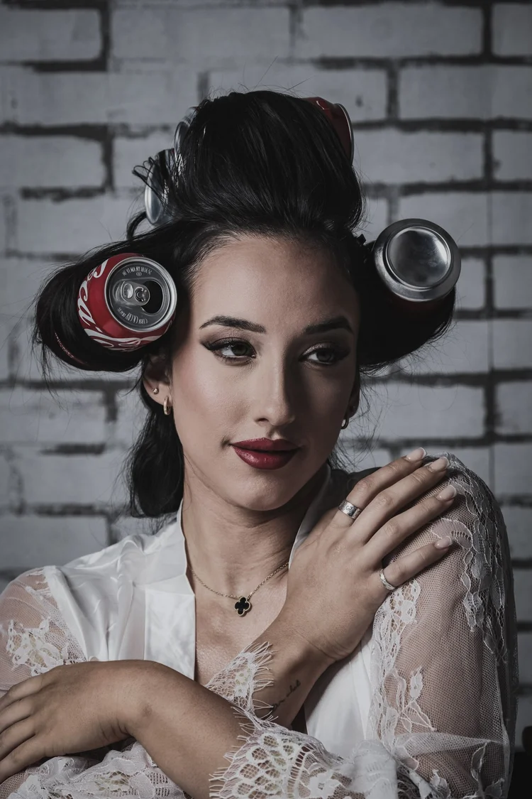 Editorial beauty portrait with soda-can hair rollers
