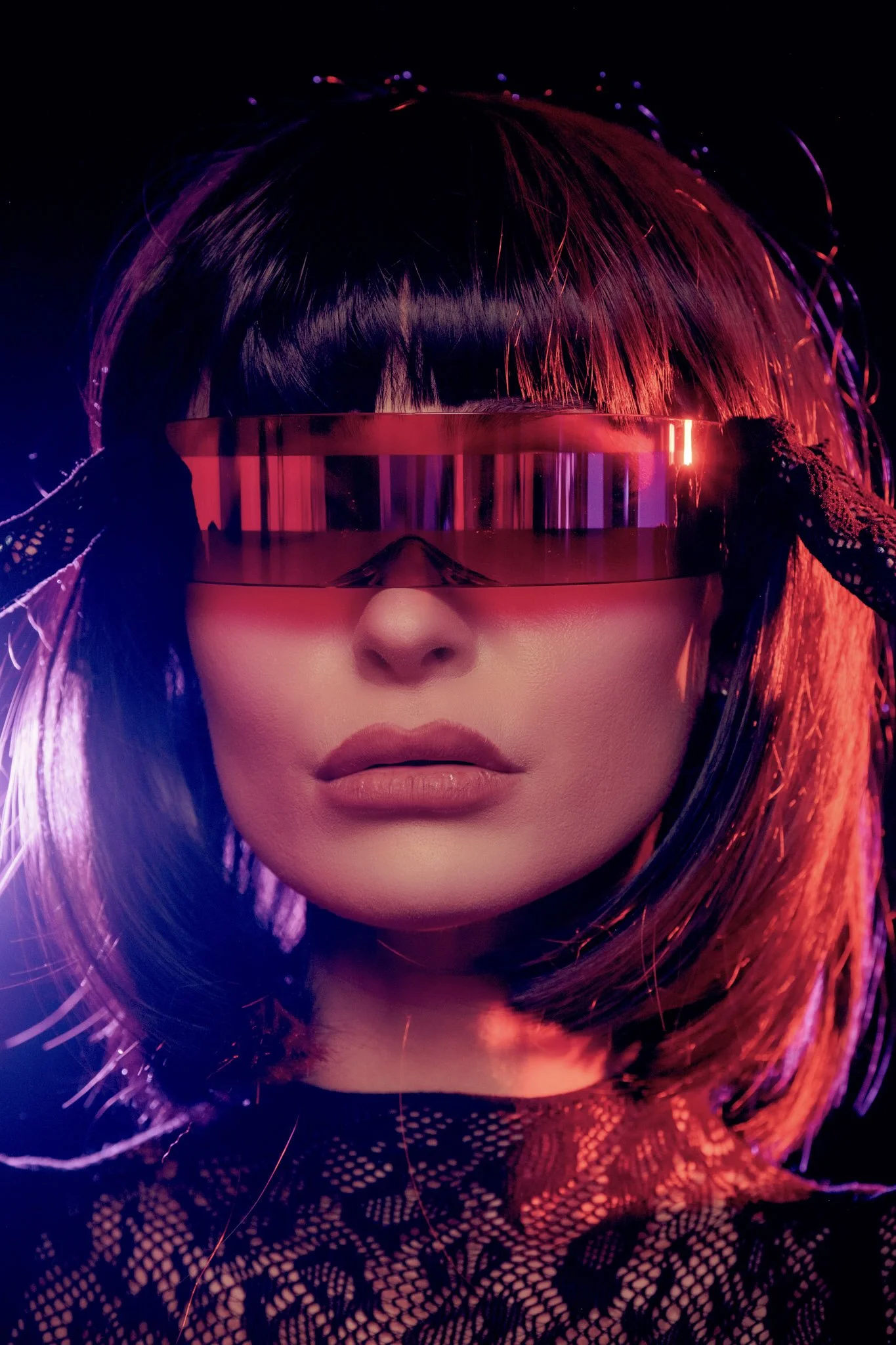 Futuristic beauty portrait in a neon visor