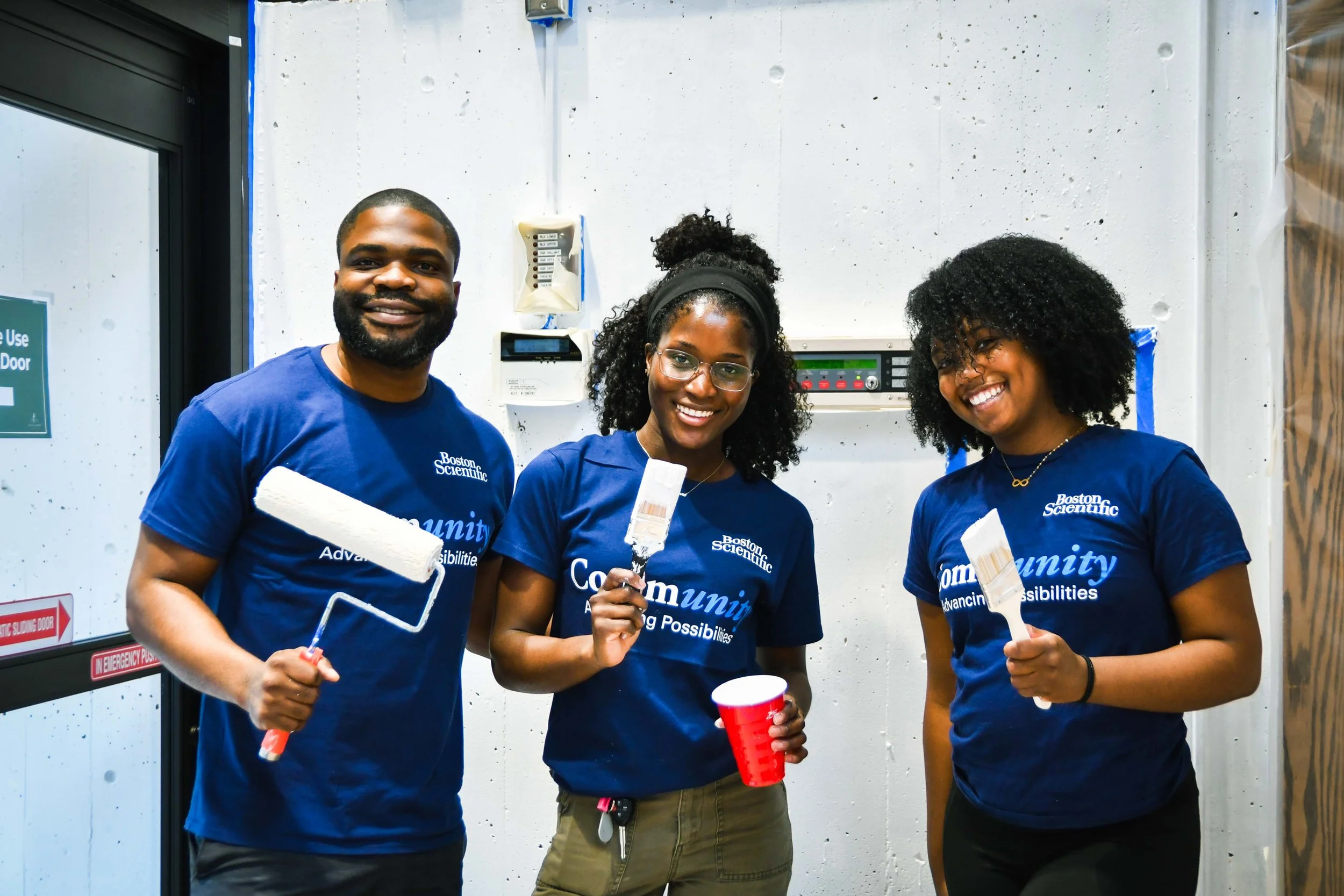 Boston Scientitic volunteers painting