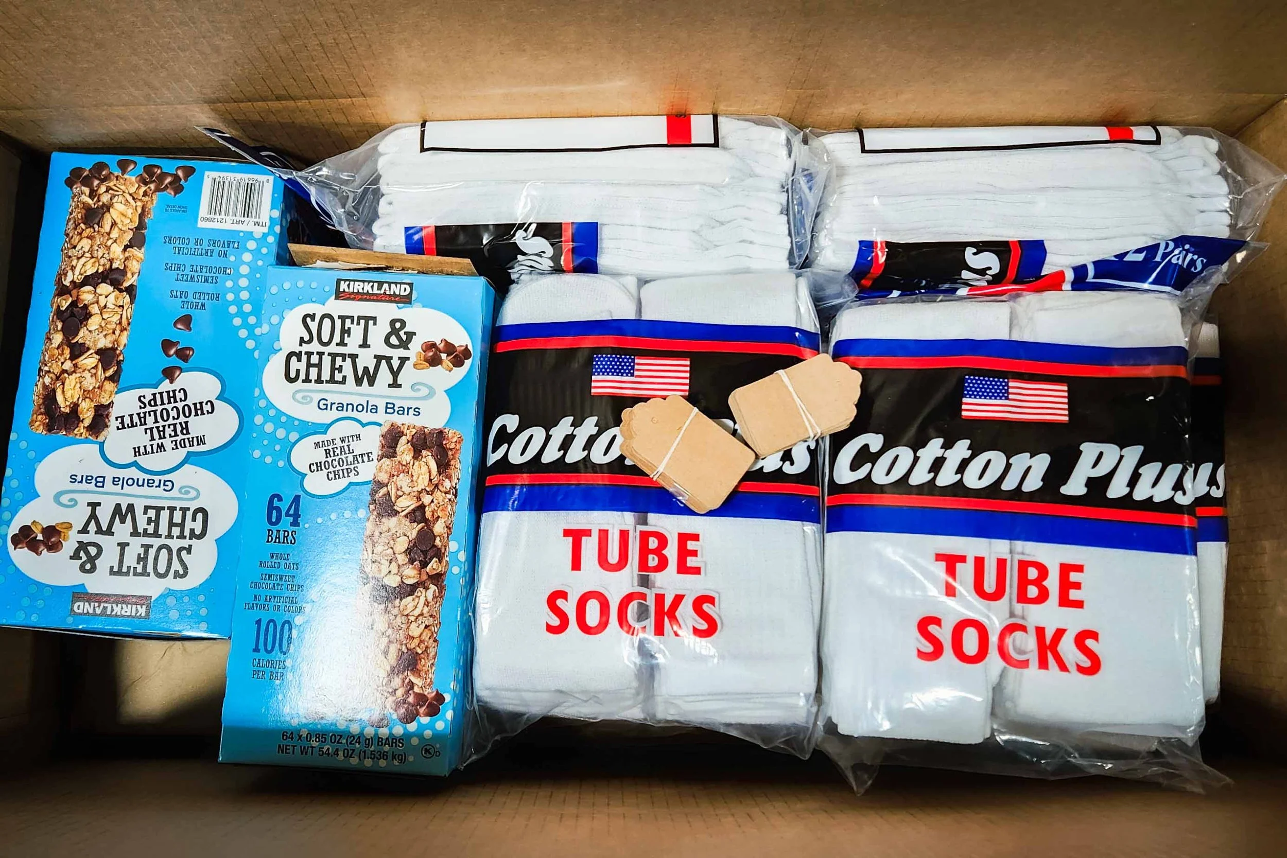 Things in a box for a sock bundle kit