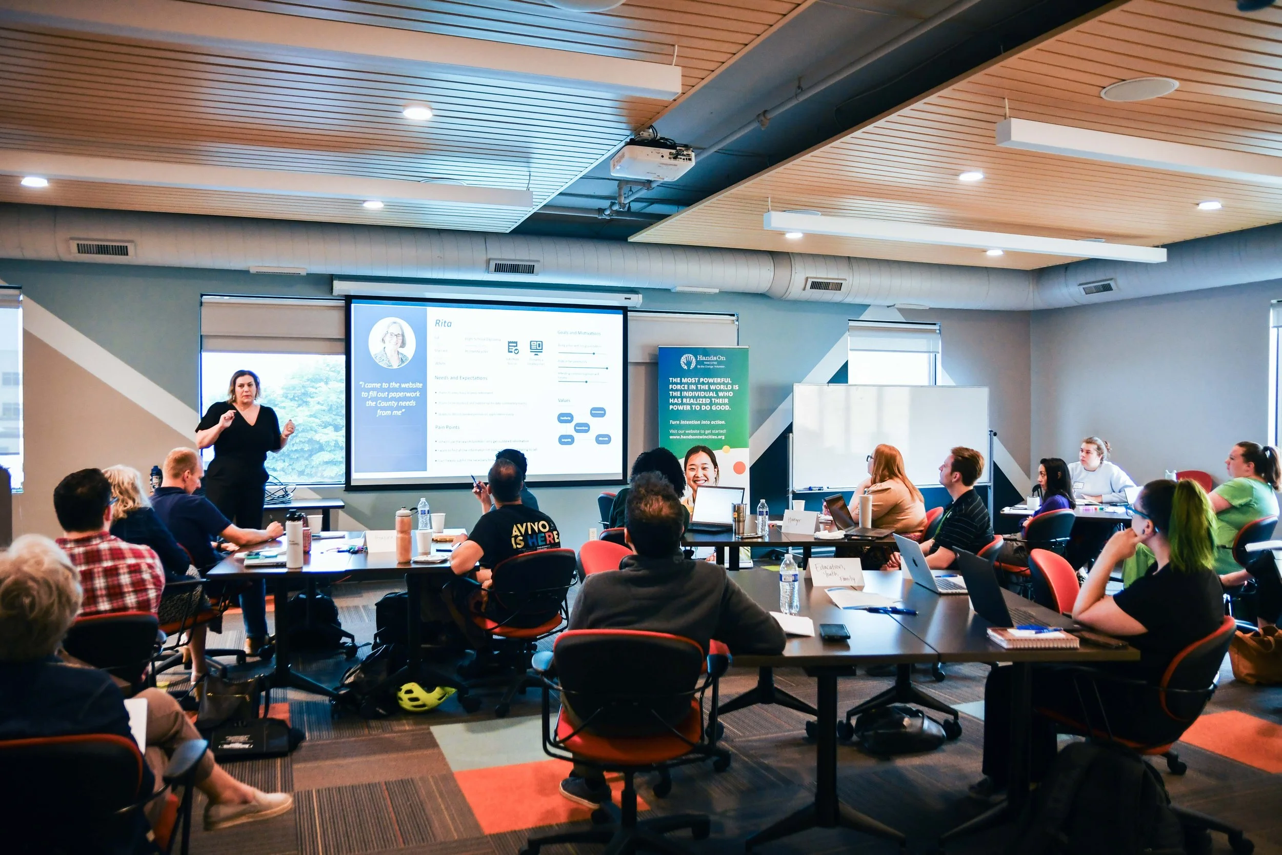 Marketing volunteer leading a marketing workshop