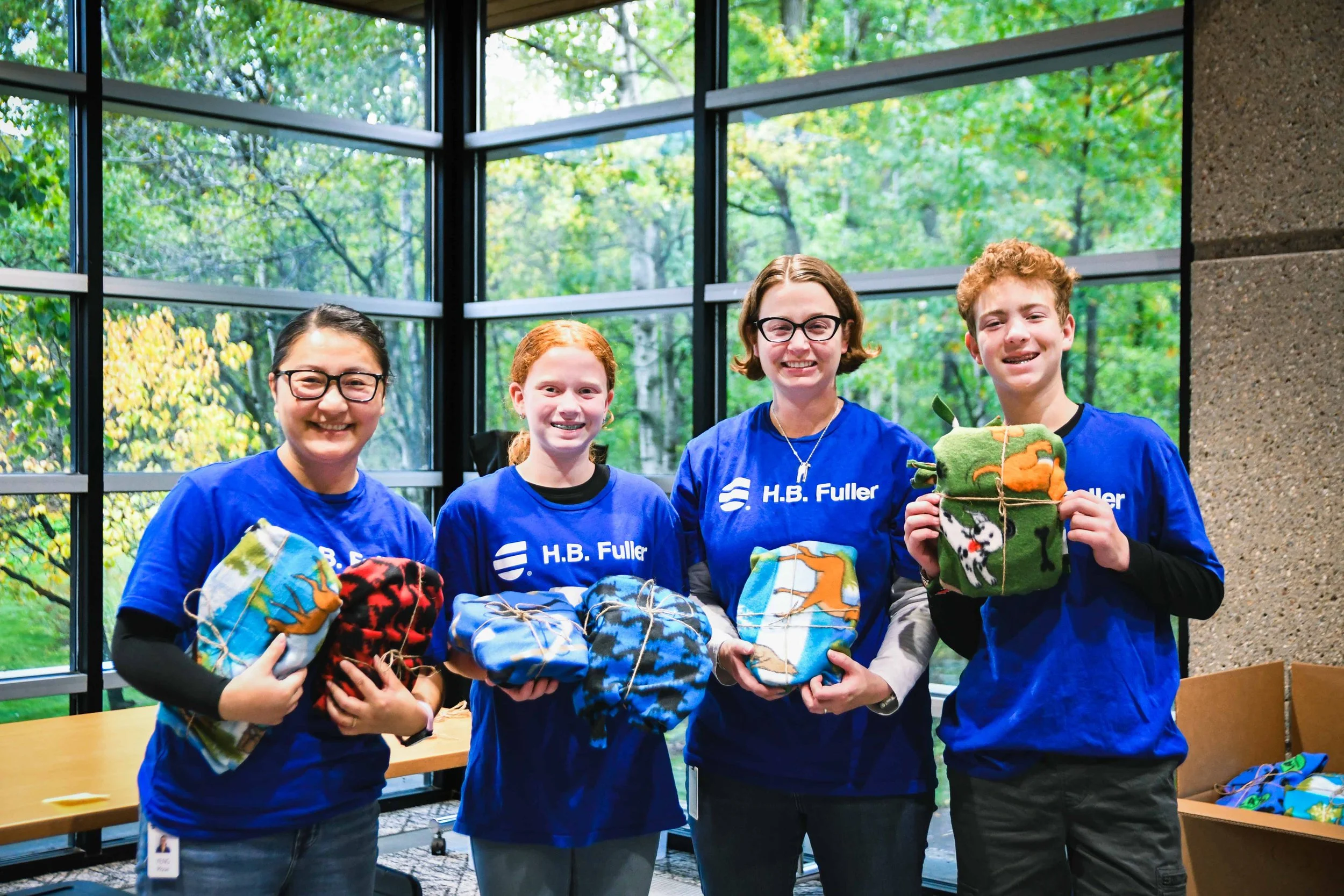 HB Fullers volunteers posing with their adoptee kits