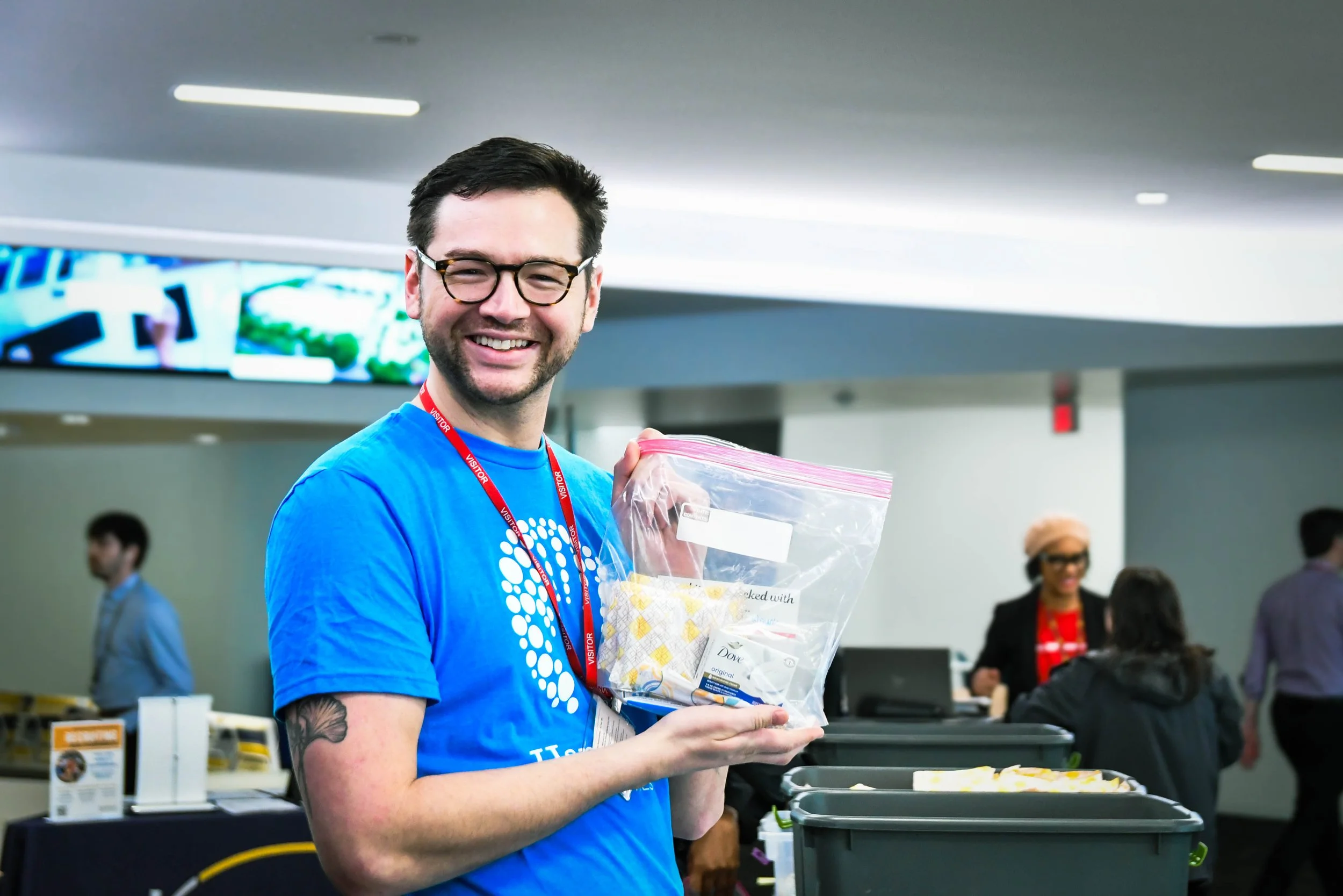 HandsOn Twin Cities team member posing with hygiene kit