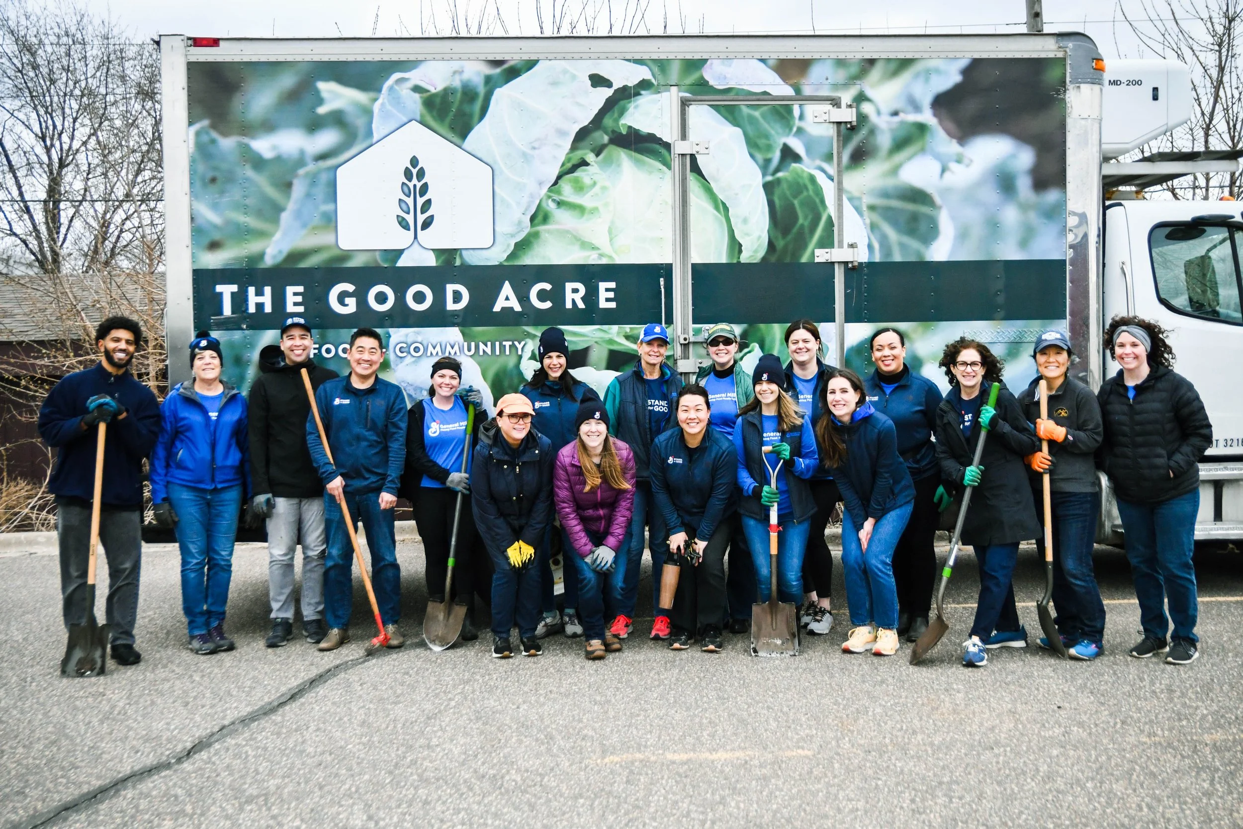 General Mills volunteers posing in front of The Good Acre truck