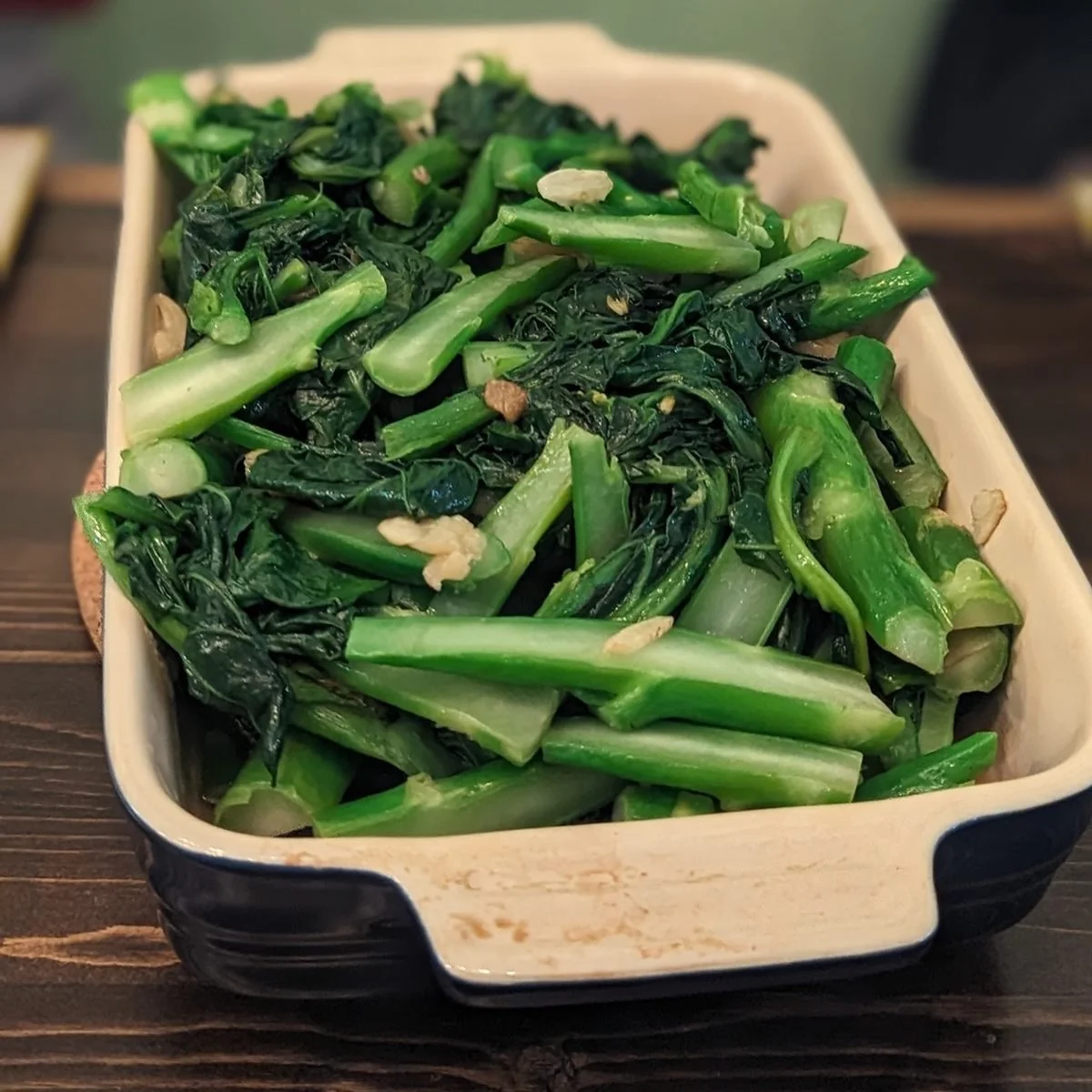 Stir-fried gai lan with garlic, part of the Asian greens and sauces class at Dash of Soy