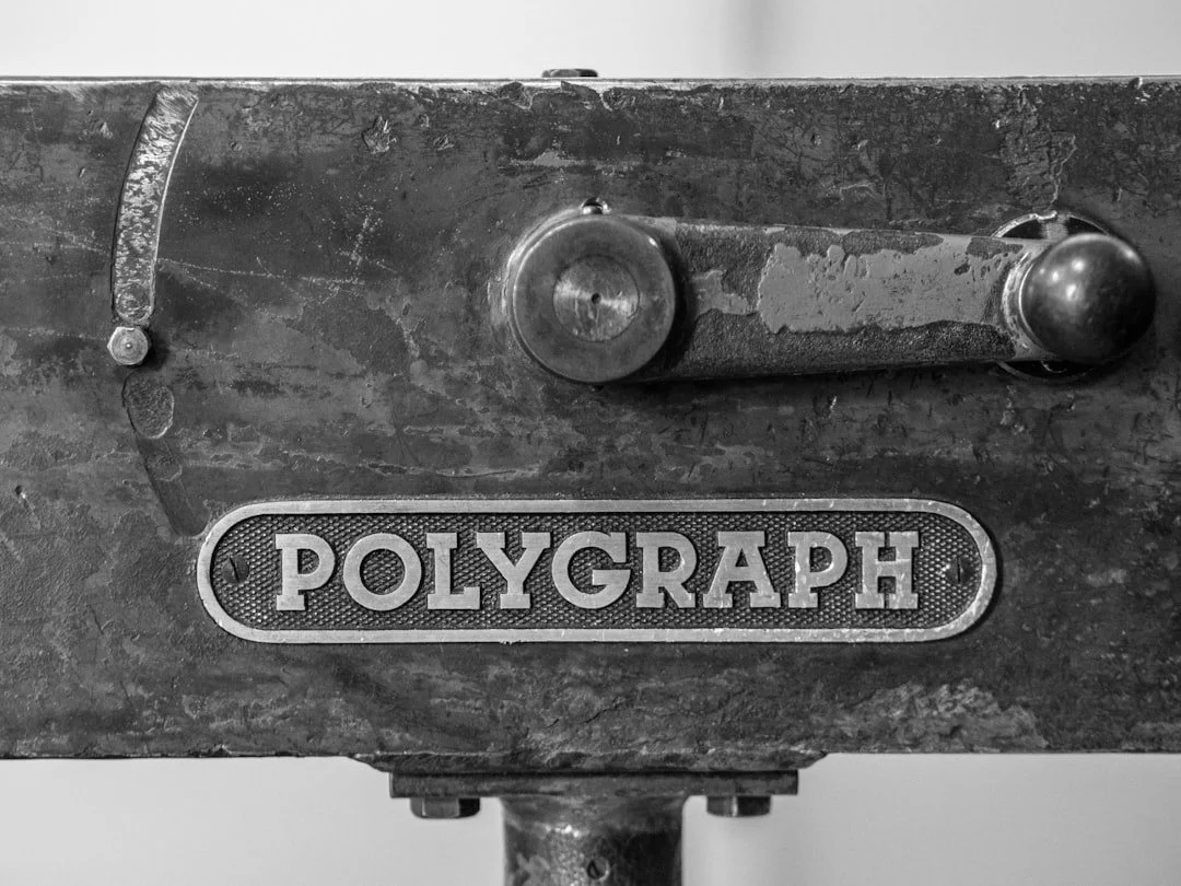 A monochrome close-up of a Polygraph camera detail