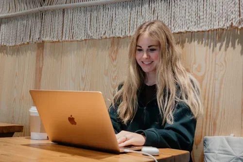 Producer planning a video project on a laptop