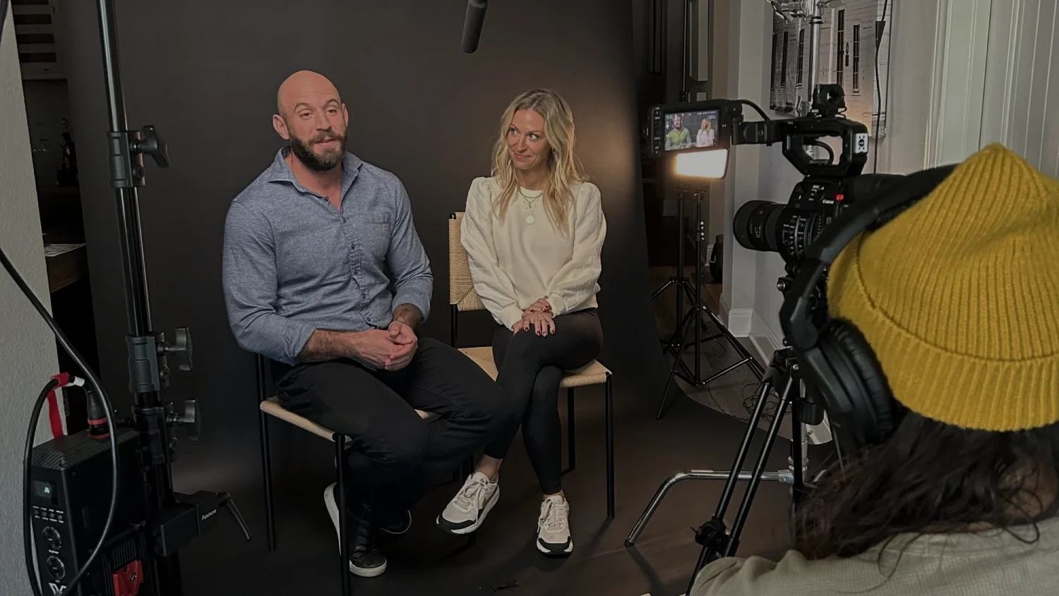 Story Media Co. crew recording an interview in a professional office