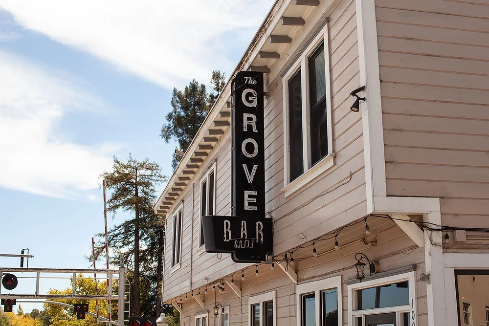 The Grove Speakeasy signage on Main Street in Penngrove