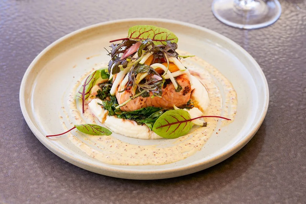 Bacon crusted Kvarøy Arctic salmon with celeriac puree and rainbow chard